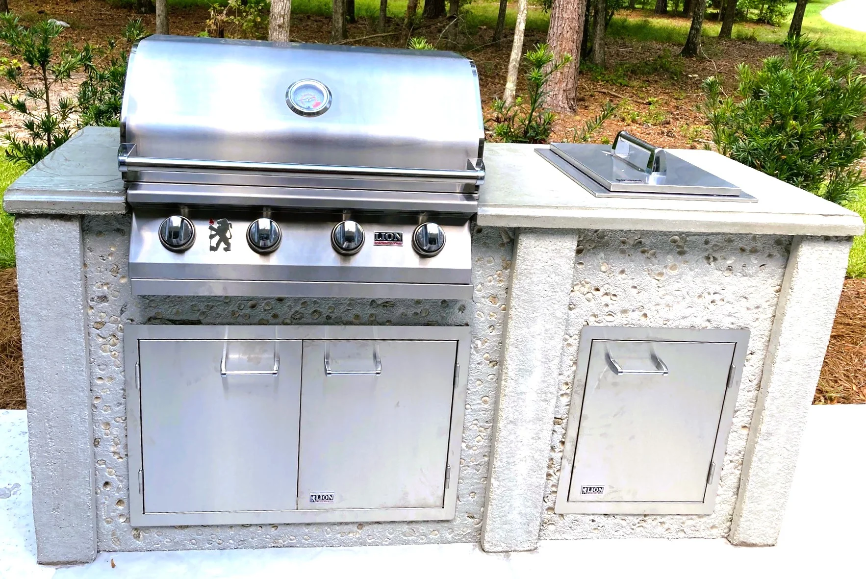 StoneKitchen chef island outdoor kitchen