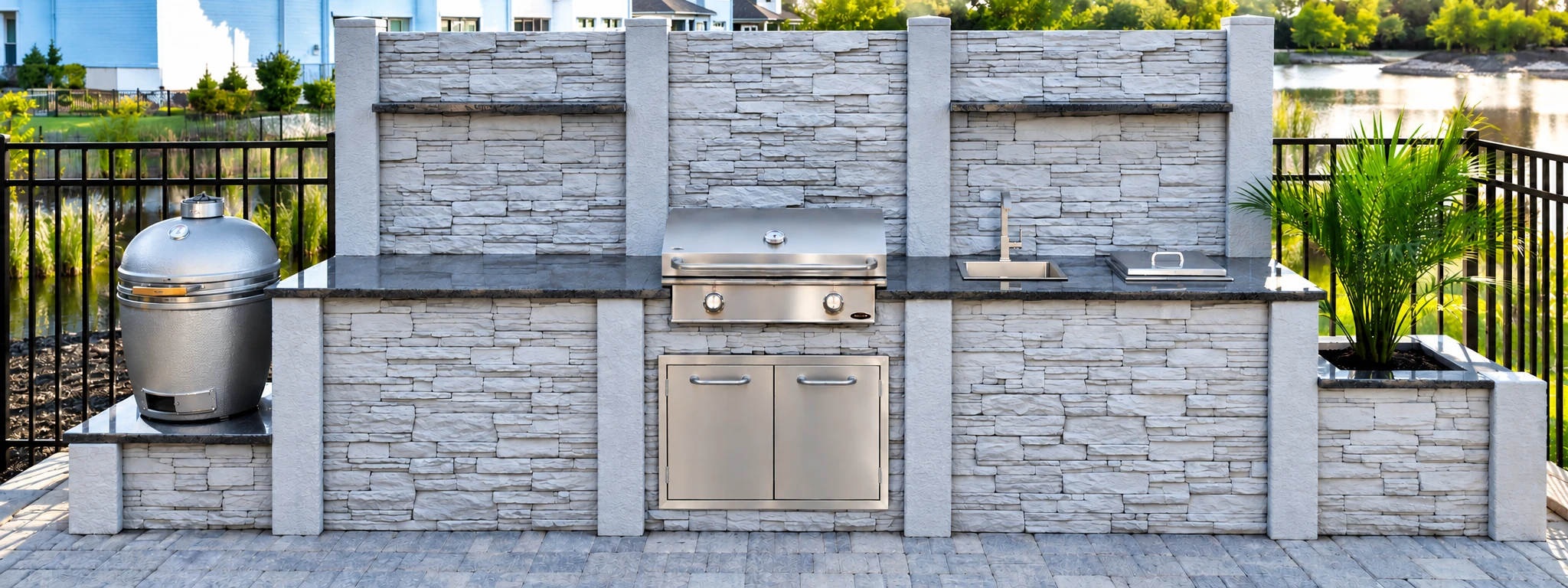 StoneKitchen® outdoor kitchen with griddle and raised backsplash in Grand Dunes, Myrtle Beach