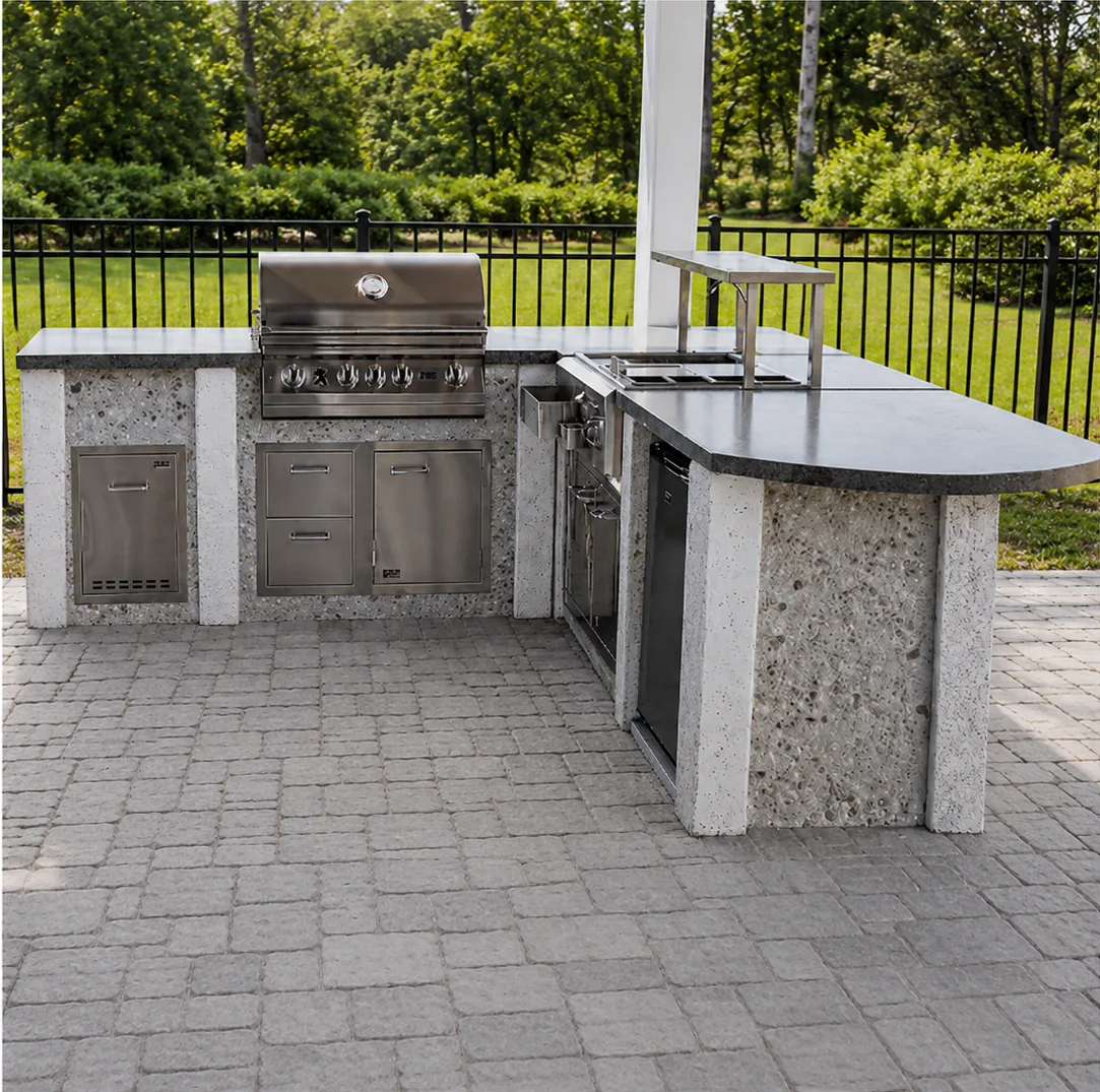 Outdoor kitchen with natural seashell finish beside the water