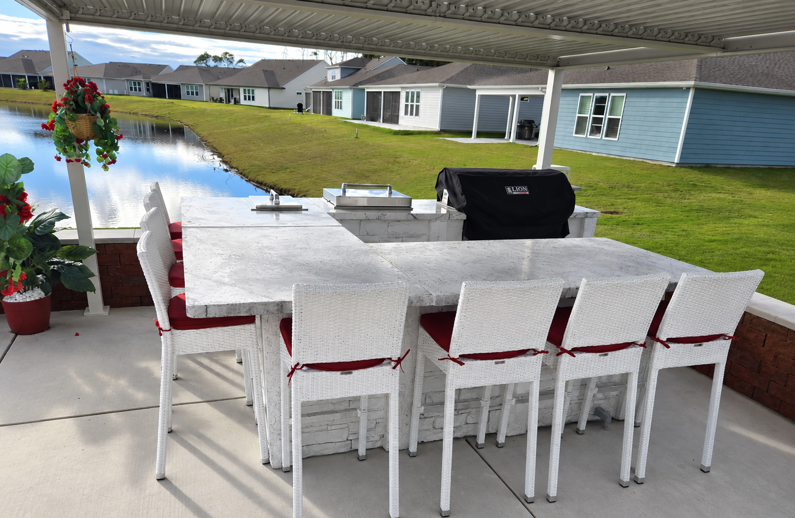 Outdoor kitchen beneath a covered patio